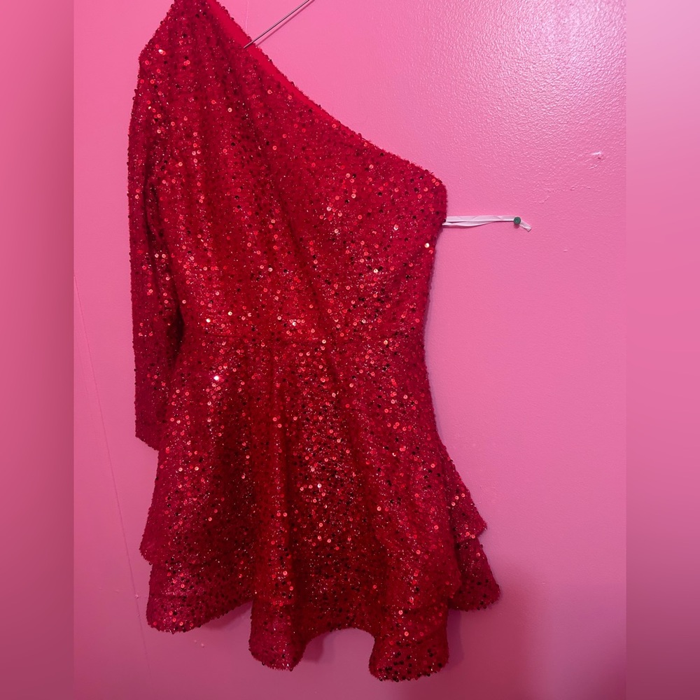 A custom sequin off the shoulder sparky mini homecoming gown